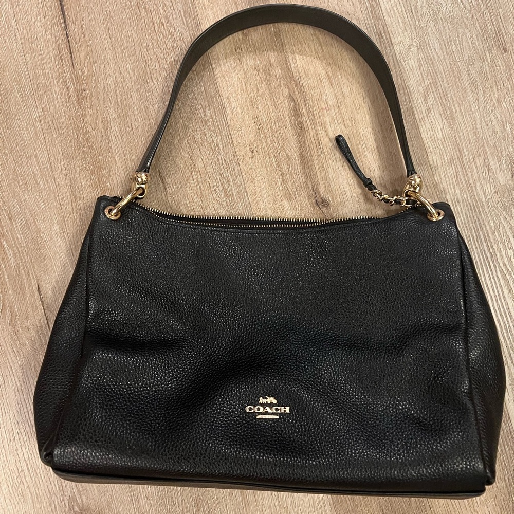 Coach short handled purse.